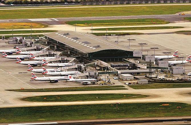 Planes are parked at the airport`s Terminal 5. Photo: PTI