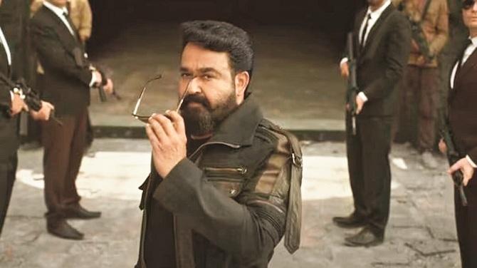 Mohanlal and others can be seen in a scene from the film `L2: Emporan`. Photo: INN