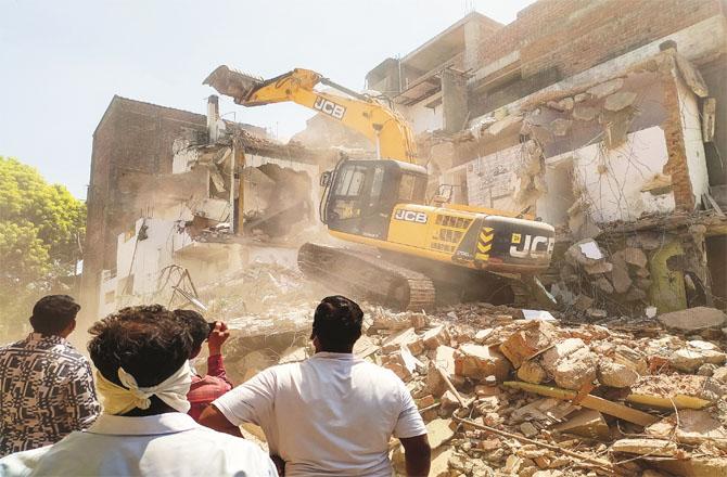 The Nagpur Municipal Corporation reduced Fahim Khan`s house to rubble on Monday morning. Photo: PTI