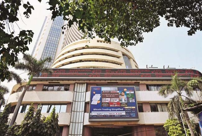 Figures are displayed on the screen of the National Stock Exchange building. Photo: Inqilab, Syed Sameer Abidi