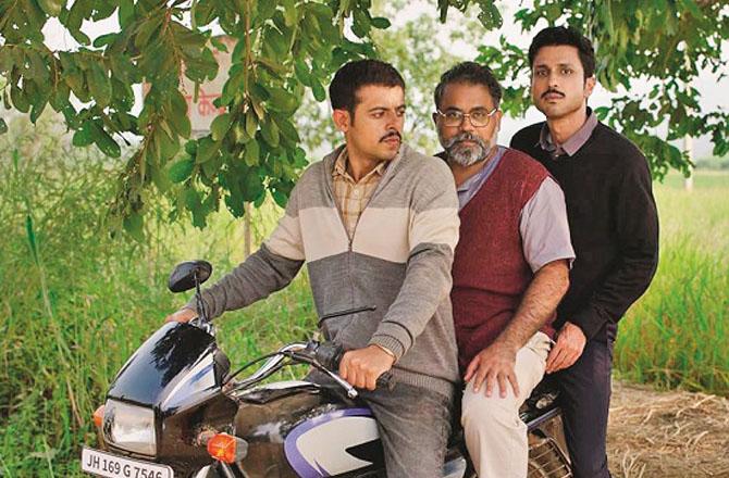 Amul Parashar, Anandeshwar Dwivedi and Akash Makhija can be seen in a scene from the web series `Gram Chakatsaliya`. Photo: INN.