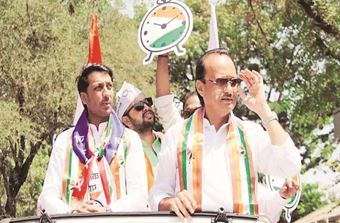 Ajit Pawar with his son Partha Pawar (file photo)