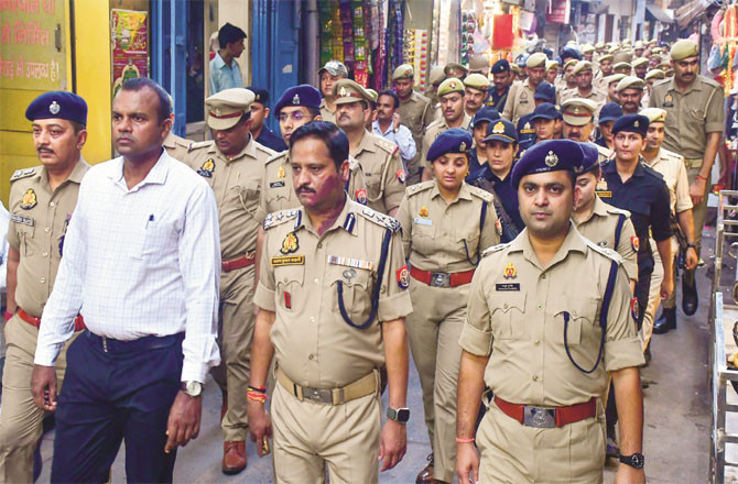 Police force was deployed in Bareilly on Friday. A flag march can be seen in the picture. (PTI)
