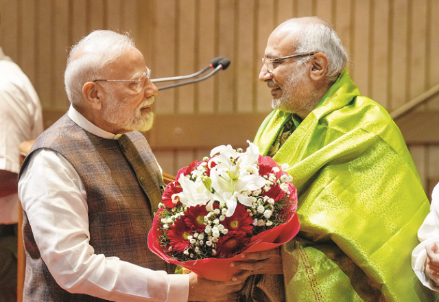 Prime Minister Modi congratulating CP Radhakrishnan. Photo: PTI