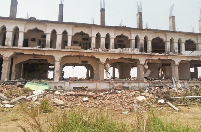 The demolition of the madrasa was stopped, but by then the building had been completely destroyed.