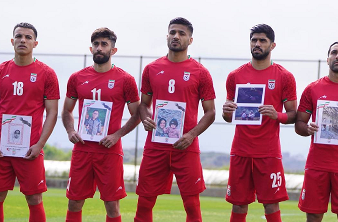 Iranian football team players with a picture of martyred children. Photo: X