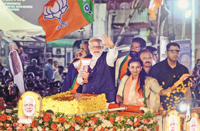 Prime Minister Modi during a roadshow in Kerala