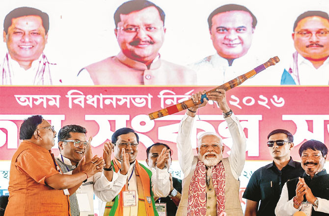 Prime Minister Narendra Modi during an election campaign in Assam. He called the Congress` "behavior" a threat to national security.