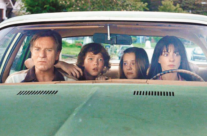Key actors from the film `The End of Oak Street` can be seen sitting in a car. Picture: INN