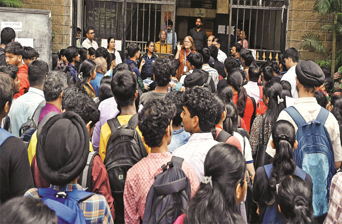 Students outside an examination centre in Matunga.