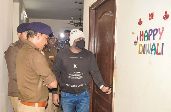 Police officers are investigating the apartment of the three girls following the suicide incident. (Photo: PTI)