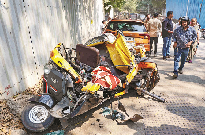 The rickshaw`s wings were blown off by the falling part of the bridge. (Photo: PTI)