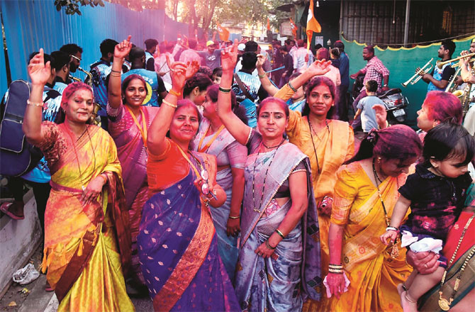BJP workers and supporters celebrate the victory of their candidate in Kalyan.