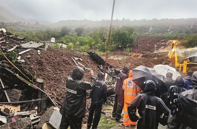 Rescue team personnel searching for people buried in the rubble (PTI)