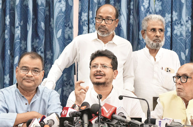 Ratanbarath Banerjee addressing a press conference along with other rebel leaders. (Photo: PTI)