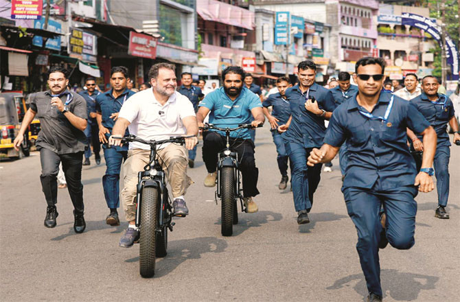 Rahul Gandhi joins cycle rally during election campaign in Kerala