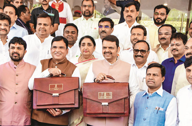 Chief Minister and Finance Minister Devendra Fadnavis, Deputy Chief Minister Sunita Pawar, Minister of State for Finance Ashish Jaiswal and others during the budget presentation. (PTI)