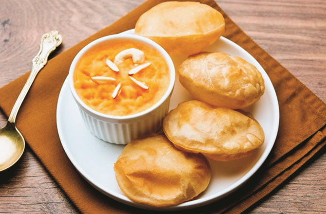 Suji Ka Halwa aur puri. Photo: INN