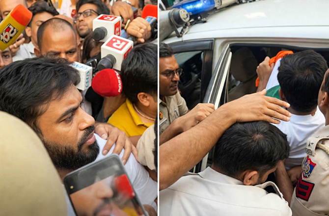 Delhi Police taking Abhijit DIpke away after arresting him. Photo: X